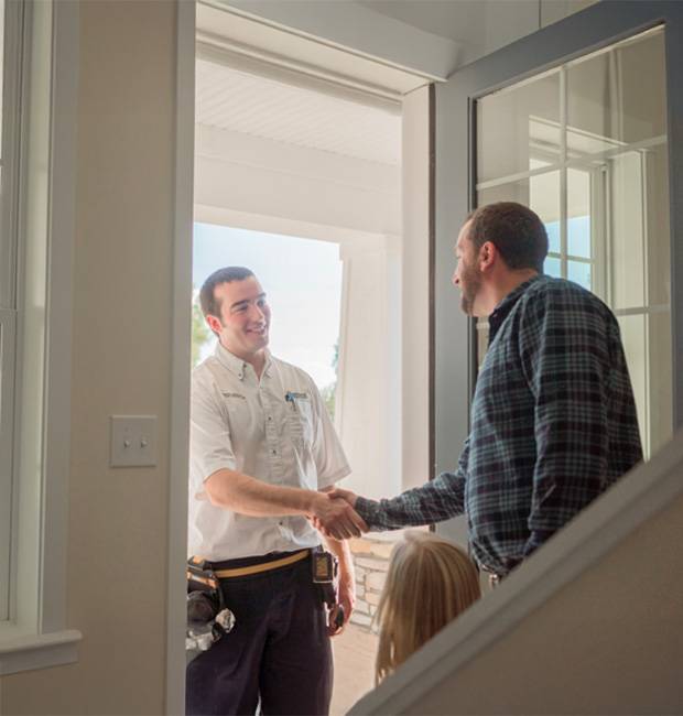 Technician and Customer Shaking Hands